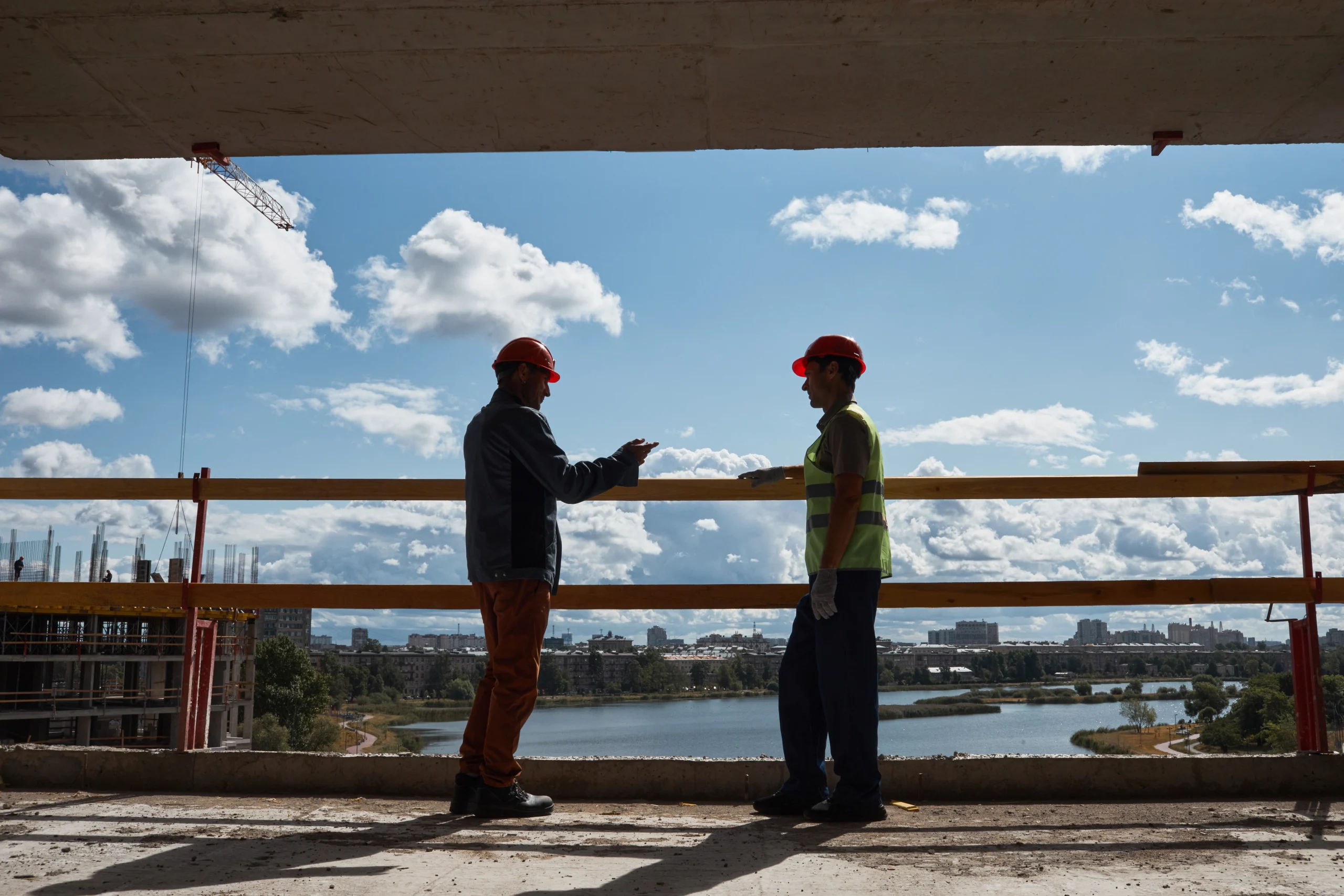 two-workers-at-construction-site-2023-11-27-05-22-24-utc